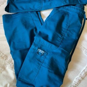 XS Cherokee workwear revolution scrub set. Blue turquoise color.
